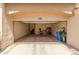 Open garage with ample storage and workspace possibilities for hobbyists or car enthusiasts at 3131 E Legacy Dr # 2113, Phoenix, AZ 85042