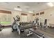 Well equipped gym with various machines, weights and mirrors for a comprehensive workout at 3131 E Legacy Dr # 2113, Phoenix, AZ 85042