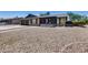 Single-story home featuring a two-car garage and a low maintenance xeriscaped front yard at 3251 W Mercer Ln, Phoenix, AZ 85029