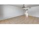 Bright living room with neutral tile flooring and white wainscoting at 3251 W Mercer Ln, Phoenix, AZ 85029