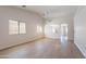 Bright and airy living room with vaulted ceilings and modern flooring throughout at 3313 W Wayland Dr, Phoenix, AZ 85041
