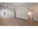 Spacious living room featuring modern wood floors and an open-concept design at 3313 W Wayland Dr, Phoenix, AZ 85041
