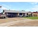 Charming single-story home with a spacious driveway and low maintenance landscaping at 3627 W Hayward Ave, Phoenix, AZ 85051