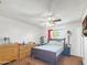 Spacious bedroom featuring a ceiling fan, natural light and neutral walls at 4122 W Las Palmaritas Dr, Phoenix, AZ 85051