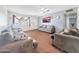 Living room featuring neutral walls, carpeting, natural light and a ceiling fan at 4122 W Las Palmaritas Dr, Phoenix, AZ 85051