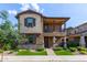 Beautiful two-story home with a balcony, inviting porch, and professionally landscaped front yard at 4173 E Jones St, Gilbert, AZ 85295