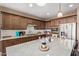 Bright kitchen featuring granite countertops, stainless steel appliances, and ample cabinet space at 4173 E Jones St, Gilbert, AZ 85295