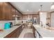 Spacious kitchen with granite countertops, stainless steel appliances, and a modern backsplash at 4173 E Jones St, Gilbert, AZ 85295