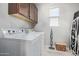 Laundry room featuring a washer, a dryer, and ample space for convenient chores at 4173 E Jones St, Gilbert, AZ 85295