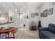 A cozy living area featuring neutral walls and carpet, with guitars and unique decorations at 4173 E Jones St, Gilbert, AZ 85295