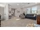 Upstairs loft area with a cozy seating area, desk, and plenty of natural light at 4173 E Jones St, Gilbert, AZ 85295