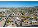 This high-angle perspective captures homes with palm trees in a well-designed neighborhood at 420 S 80Th Pl, Mesa, AZ 85208