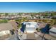 Aerial shot of a residential area with homes and desert landscaping on a clear day at 420 S 80Th Pl, Mesa, AZ 85208
