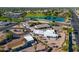 This aerial captures a lovely residential area with a serene blue pond at 420 S 80Th Pl, Mesa, AZ 85208