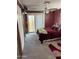 Cozy bedroom with a ceiling fan, sliding glass doors, and mirrored closet doors at 420 S 80Th Pl, Mesa, AZ 85208