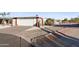 A home showcasing a garage and a welcoming facade, surrounded by rocks and desert plants at 420 S 80Th Pl, Mesa, AZ 85208