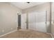 Bedroom with closet, ceiling fan, and natural light at 4326 E Cloudburst Ct, Gilbert, AZ 85297
