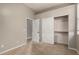 Another spacious bedroom with an adjacent bathroom and closet at 4326 E Cloudburst Ct, Gilbert, AZ 85297
