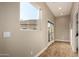 An additional view of the living room with natural light and wood-look flooring at 4326 E Cloudburst Ct, Gilbert, AZ 85297