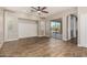 Bright living space with modern flooring, neutral tones, and seamless indoor-outdoor flow at 4326 E Cloudburst Ct, Gilbert, AZ 85297