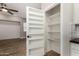 Pantry with open shelving for ample storage at 4326 E Cloudburst Ct, Gilbert, AZ 85297
