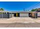 Charming single-level home with a two car garage, yellow door and low maintenance desert landscaping at 4435 N 35Th St, Phoenix, AZ 85018