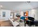 Spacious living room with modern furnishings, light walls, wood floors, and lots of natural light at 4435 N 35Th St, Phoenix, AZ 85018
