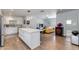 Bright open floor plan featuring a modern kitchen with an island and seamless flow into the living area at 4435 N 35Th St, Phoenix, AZ 85018