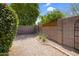 Desert rock landscaping in backyard with privacy wall at 4615 W Del Rio St, Chandler, AZ 85226