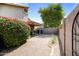 Desert rock landscaping in backyard with privacy wall at 4615 W Del Rio St, Chandler, AZ 85226