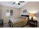 Inviting bedroom with a queen-sized bed, stylish furnishings, and soft, neutral tones at 4615 W Del Rio St, Chandler, AZ 85226