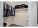 Walk-in closet with ample shelving, hanging space, and organized storage at 4615 W Del Rio St, Chandler, AZ 85226