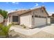 Charming single-story home with a two-car garage and low-maintenance desert landscaping at 4615 W Del Rio St, Chandler, AZ 85226