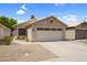 Charming single-story home with a two-car garage and low-maintenance desert landscaping at 4615 W Del Rio St, Chandler, AZ 85226