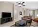 Comfortable living room featuring vaulted ceilings and neutral color palette at 4615 W Del Rio St, Chandler, AZ 85226