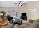 Comfortable living room featuring vaulted ceilings and access to patio at 4615 W Del Rio St, Chandler, AZ 85226