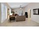 Cozy living room featuring vaulted ceilings and neutral color palette at 4615 W Del Rio St, Chandler, AZ 85226