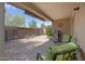 Covered patio with tiled floor, barbecue, and comfortable seating at 4615 W Del Rio St, Chandler, AZ 85226