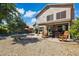Charming backyard with pool, patio, fire pit, and mature trees, perfect for outdoor living and entertaining at 4626 E Summerhaven Dr, Phoenix, AZ 85044