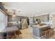 Bright kitchen with stainless steel appliances, gray cabinets, a breakfast bar, and open layout for easy entertaining at 4626 E Summerhaven Dr, Phoenix, AZ 85044