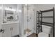 Contemporary bathroom with a glass-enclosed shower, modern fixtures, and ample vanity space at 475 N 9Th St # 206, Phoenix, AZ 85006