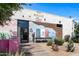 Exterior view of Gallo Blanco restaurant featuring a colorful mural and outdoor seating at 475 N 9Th St # 206, Phoenix, AZ 85006