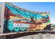 Welcome to Roosevelt Row mural on a building, showcasing artistic neighborhood charm at 475 N 9Th St # 206, Phoenix, AZ 85006