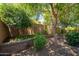 A private, landscaped backyard provides a serene outdoor space for relaxation at 5208 W Straight Arrow Ln, Phoenix, AZ 85083