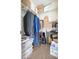 Organized closet space providing efficient storage solutions in a well-lit environment at 5208 W Straight Arrow Ln, Phoenix, AZ 85083