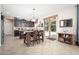 Well-equipped kitchen with granite countertops, stainless steel appliances, and an island with seating at 5208 W Straight Arrow Ln, Phoenix, AZ 85083