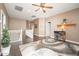 Loft area with hardwood flooring, a ceiling fan, and a cozy desk with a chair at 5208 W Straight Arrow Ln, Phoenix, AZ 85083