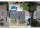 Aerial view of the property featuring a pool, seating area, lawn and landscaping at 5937 E Corrine Dr, Scottsdale, AZ 85254
