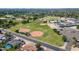Aerial view of the neighborhood baseball fields and a local school at 5937 E Corrine Dr, Scottsdale, AZ 85254