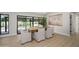Bright dining area with sliding glass doors leads to a well-maintained backyard and patio at 5937 E Corrine Dr, Scottsdale, AZ 85254